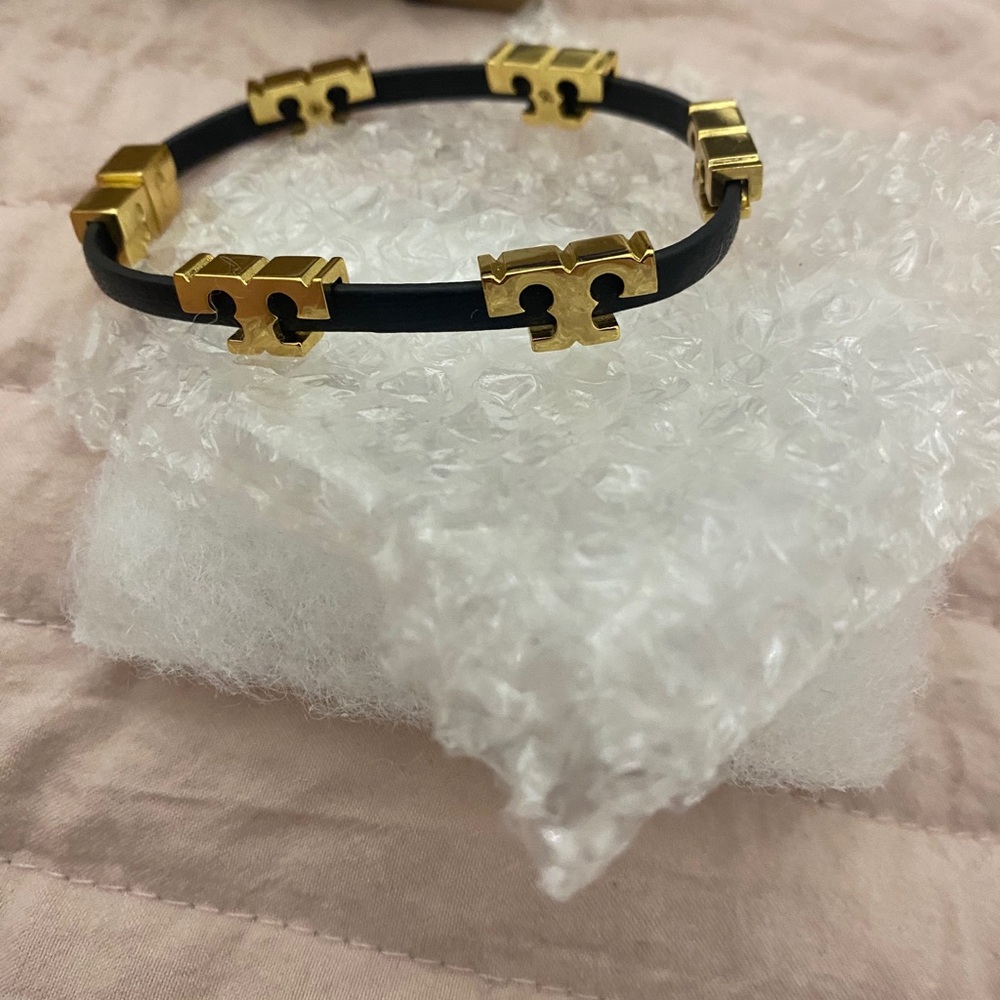 black and gold tory burch bracelet